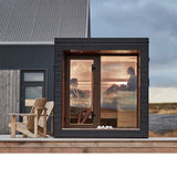 Stylishly designed outdoor sauna with all-glass doors for a luxurious family spa experience