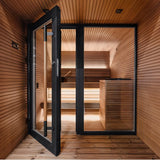 Stylishly designed outdoor sauna with all-glass doors for a luxurious family spa experience