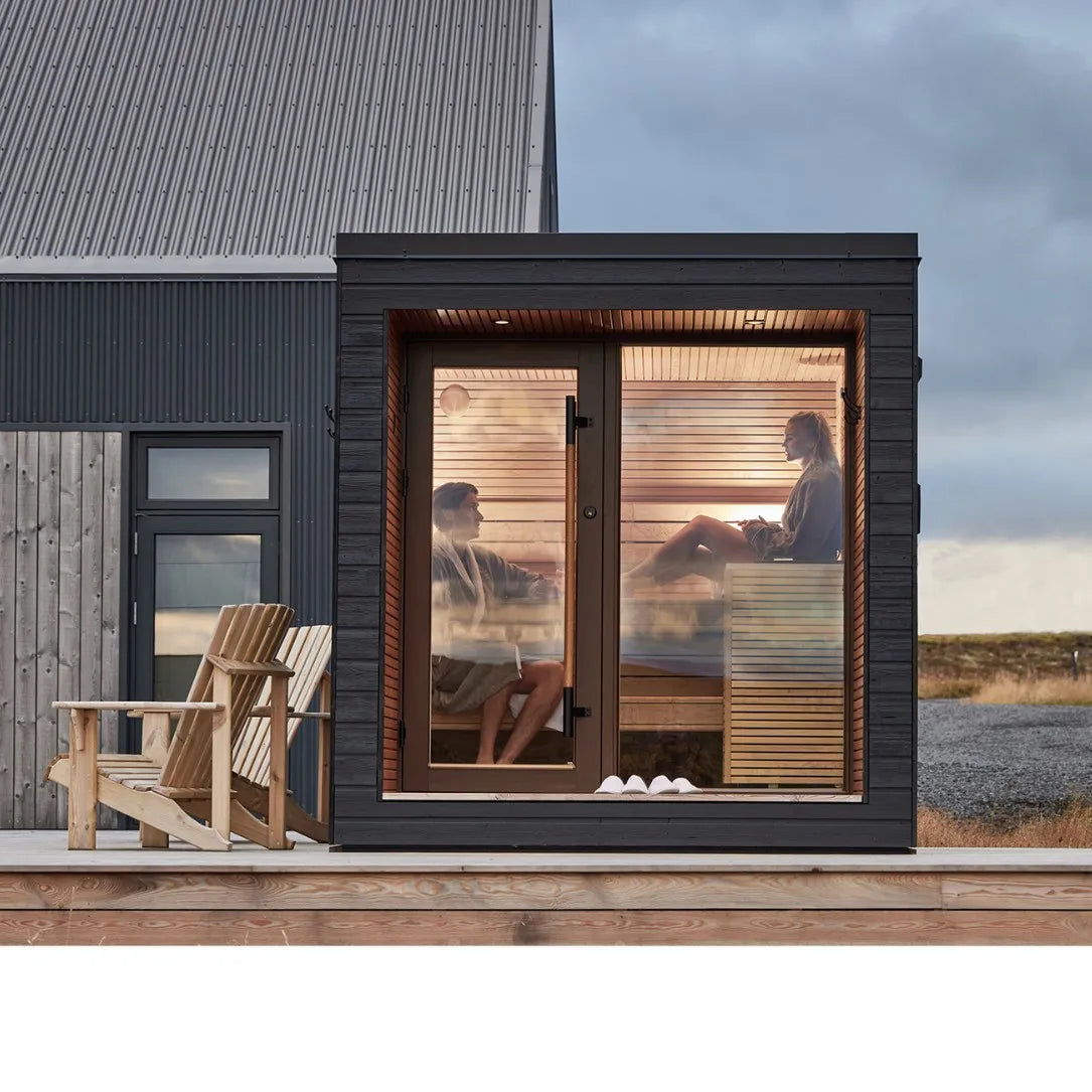 Stylishly designed outdoor sauna with all-glass doors for a luxurious family spa experience